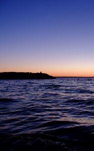 Preview wallpaper sea, sunset, loneliness, alone, silhouette, rocks