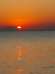 Preview wallpaper sea, sunset, mountains, sky, nature, dark