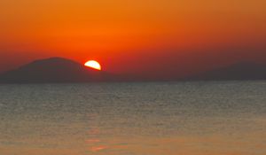 Preview wallpaper sea, sunset, mountains, sky, nature, dark