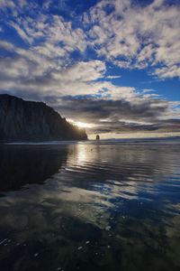 Preview wallpaper sea, sunset, rock, water, birds, beach