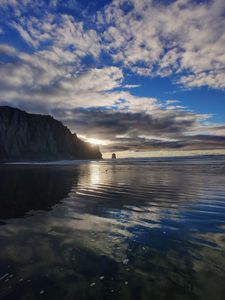 Preview wallpaper sea, sunset, rock, water, birds, beach