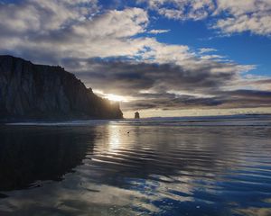 Preview wallpaper sea, sunset, rock, water, birds, beach