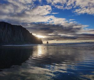 Preview wallpaper sea, sunset, rock, water, birds, beach