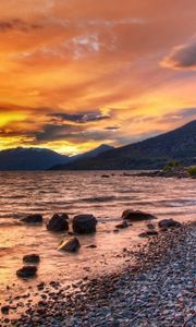 Preview wallpaper sea, sunset, rocks, beach, nature