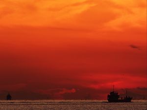 Preview wallpaper sea, sunset, ship, dark, dusk