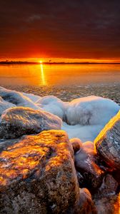 Preview wallpaper sea, sunset, shore, stones, ice
