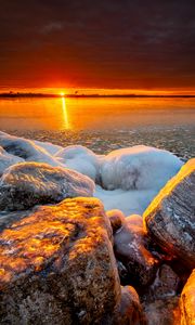 Preview wallpaper sea, sunset, shore, stones, ice