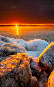 Preview wallpaper sea, sunset, shore, stones, ice