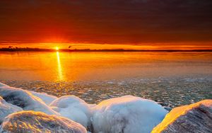 Preview wallpaper sea, sunset, shore, stones, ice