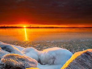 Preview wallpaper sea, sunset, shore, stones, ice