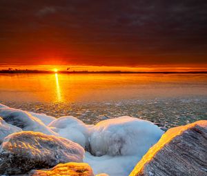 Preview wallpaper sea, sunset, shore, stones, ice