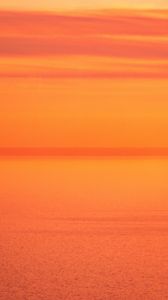 Preview wallpaper sea, sunset, sky, glare, pink