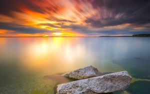 Preview wallpaper sea, sunset, stones, water, shore