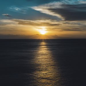 Preview wallpaper sea, sunset, sun, horizon, ripples, waves