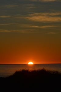 Preview wallpaper sea, sunset, sun, water, dusk, evening