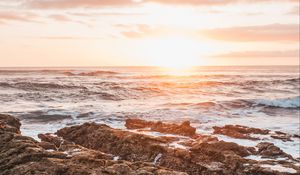 Preview wallpaper sea, sunset, waves, coast, sunlight