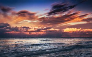 Preview wallpaper sea, sunset, waves, clouds, dusk