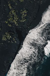 Preview wallpaper sea, surf, aerial view, foam, ocean, dark, rocks