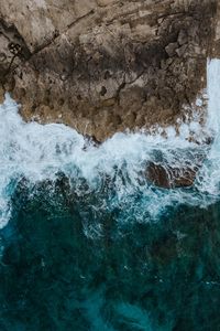 Preview wallpaper sea, surf, aerial view, rocks, foam