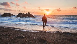 Preview wallpaper sea, surf, alone, sunset, man, solitude, wales, united kingdom