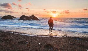 Preview wallpaper sea, surf, alone, sunset, man, solitude, wales, united kingdom