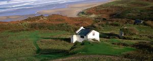 Preview wallpaper sea, surf, building, grass