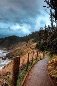 Preview wallpaper sea, the road along the sea, clouds, landscape