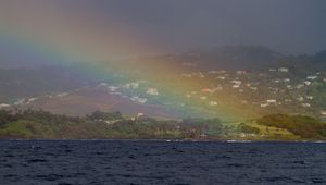 Preview wallpaper sea, trees, rainbow, houses