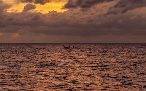 Preview wallpaper sea, water, boat, clouds, sky, twilight