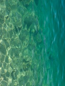 Preview wallpaper sea, water, bottom, stones, glare, nature