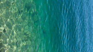 Preview wallpaper sea, water, bottom, stones, glare, nature