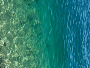 Preview wallpaper sea, water, bottom, stones, glare, nature