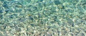 Preview wallpaper sea, water, bottom, stones, pebbles, glare