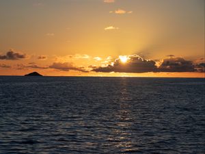 Preview wallpaper sea, water, clouds, sun, sunset
