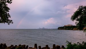 Preview wallpaper sea, water, rainbow, horizon, twilight