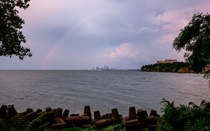 Preview wallpaper sea, water, rainbow, horizon, twilight