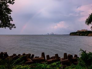 Preview wallpaper sea, water, rainbow, horizon, twilight