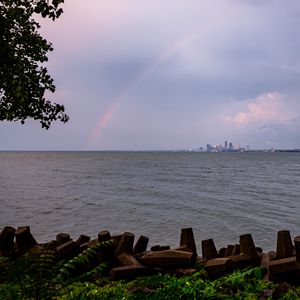 Preview wallpaper sea, water, rainbow, horizon, twilight