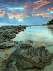 Preview wallpaper sea, water, transparent, coast, bottom, stones, decline, sky, shades