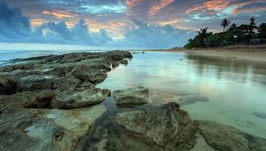 Preview wallpaper sea, water, transparent, coast, bottom, stones, decline, sky, shades