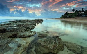 Preview wallpaper sea, water, transparent, coast, bottom, stones, decline, sky, shades