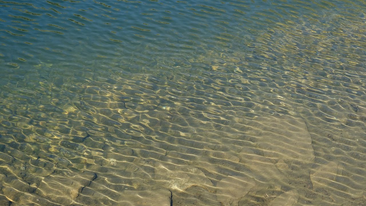 Wallpaper sea, water, waves, glare, stones