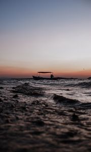 Preview wallpaper sea, waves, boat, silhouette, dark, dusk