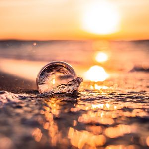 Preview wallpaper sea, waves, bubble, foam, sunset