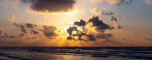 Preview wallpaper sea, waves, clouds, rays, sunset