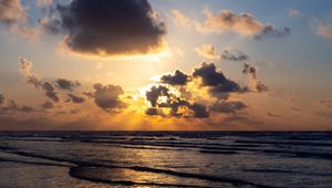 Preview wallpaper sea, waves, clouds, rays, sunset