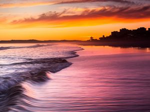 Preview wallpaper sea, waves, decline, coast, evening, water, city