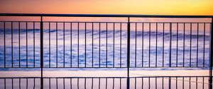 Preview wallpaper sea, waves, fence, stripes, reflection, twilight