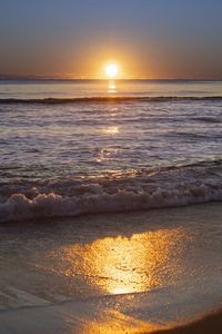 Preview wallpaper sea, waves, foam, coast, sunset, horizon