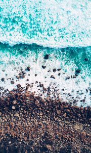 Preview wallpaper sea, waves, foam, shore, stones, pebbles, aerial view